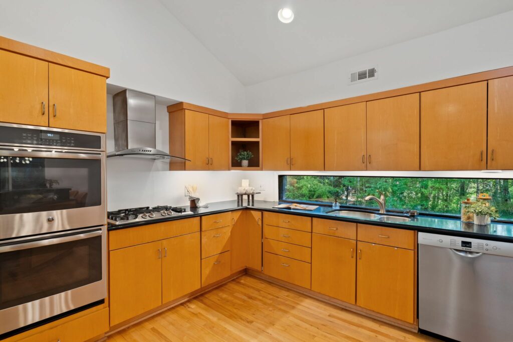 Find the top selling real estate agent in Atlanta, moving to Atlanta, mid century modern homes for sale in metro Atlanta